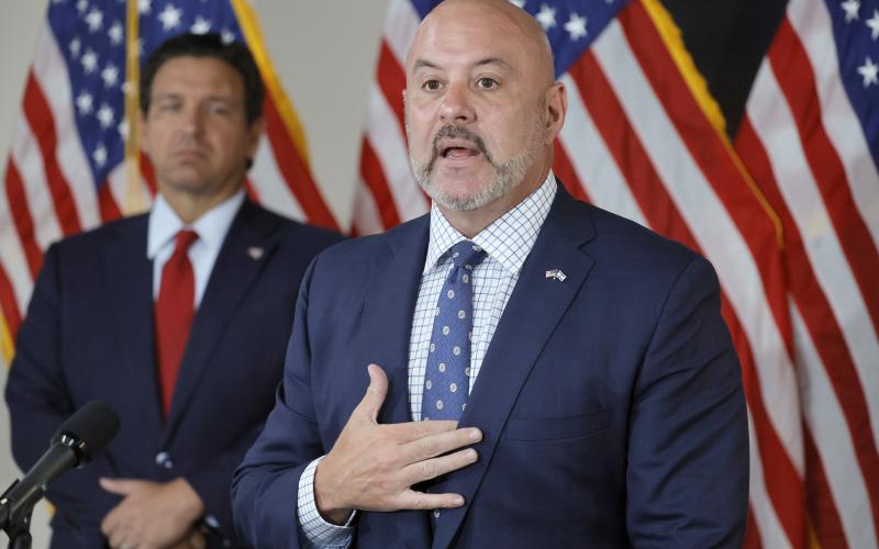 Florida Chief Financial Officer Blaise Ingoglia speaks as Governor Ron DeSantis looks on during a news conference Tuesday at the FDOT District 4 office in Fort Lauderdale announcing an audit of Broward County’s spending. (Amy Beth Bennett/South Florida Sun Sentinel/TNS)