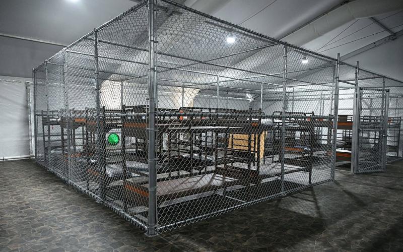 Beds are seen inside a migrant detention center, dubbed ‘Alligator Alcatraz,’ in Ochopee. (ANDREW CABALLERO-REYNOLDS/AFP via Getty Images)