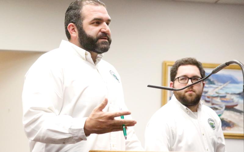 Live Oak Community Redevelopment Agency Director Nicholas Frigiola said allowing staff to greenlight the start of projects within the district would streamline the process. CRA Assistant Christian Dixon looks on. (JAMIE WACHTER/Lake City Reporter)