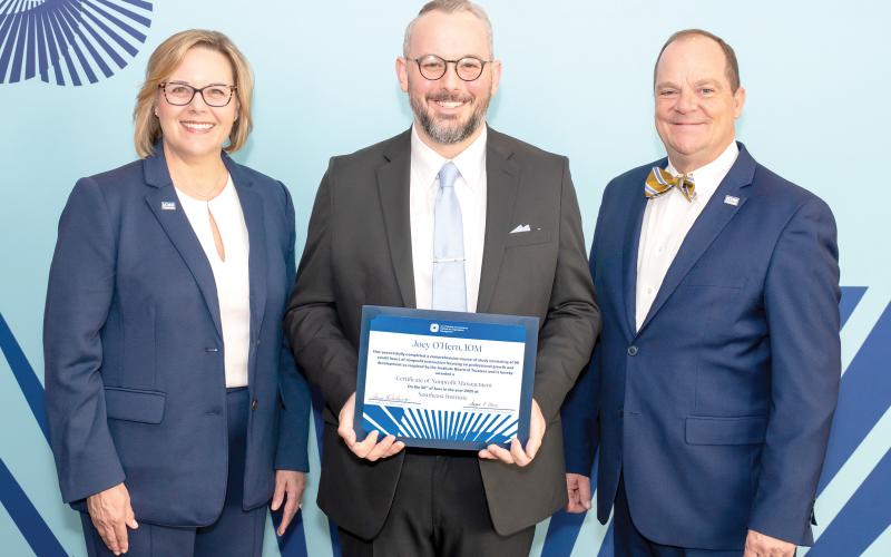 Lake City-Columbia County Chamber of Commerce Executive Director Joey O’Hern (middle) recently completed the Institute for Organization Management. (COURTESY)