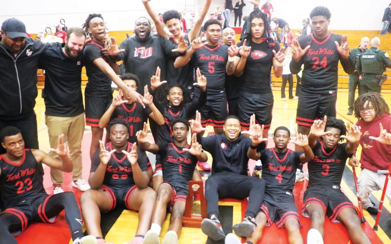 Fort White's boys basketball team won its first regional title.