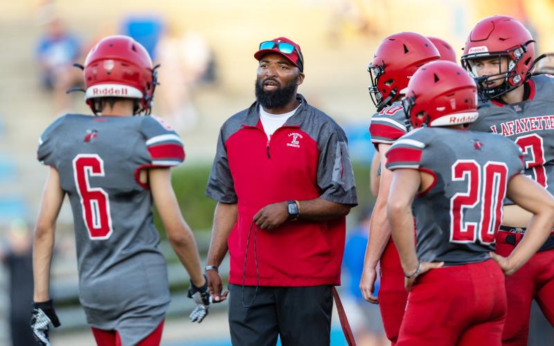 Lafayette coach Marcus Edwards speaks to his players during their spring jamboree in May. (FILE)