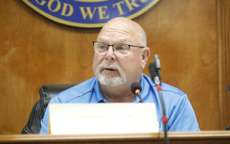 NFWUA Chairman Rocky Ford congratulated Executive Director Shannon Roberts for his work thus far with the Authority. (JAMIE WACHTER/Lake City Reporter)