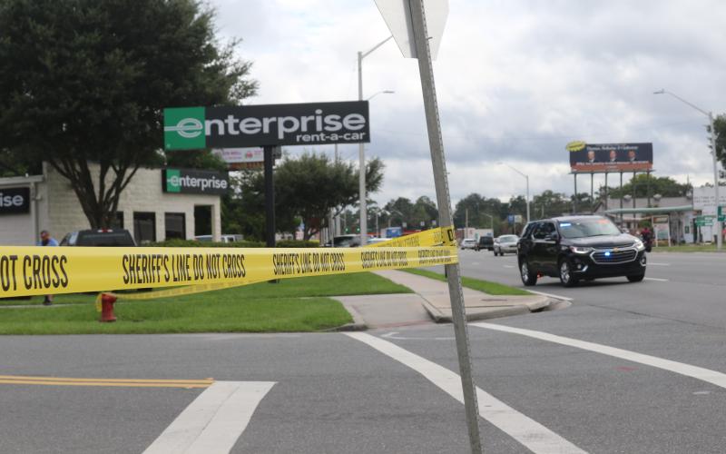 Law enforcement officials converged at the Enterprise Rent-A-Car facility on U.S. Highway 90 after an employee noticed a strange device in a car during vehicle inspections. The device was deemed not dangerous by the Alachua County Sheriff’s Office Bomb Squad. (JAMIE WACHTER/Lake City Reporter)