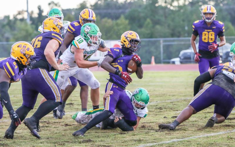 Columbia receiver Kyren Caldwell is tackled from behind during last season’s 13-0 win over Suwannee. (BRENT KUYKENDALL/Lake City Reporter)