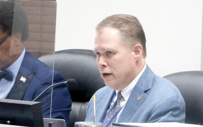 Lake City Attorney Clay Martin gave a brief summary of the city’s involvement with the history of the Club House on Lake Isabella on Thursday. (MORGAN MCMULLEN/Lake City Reporter)