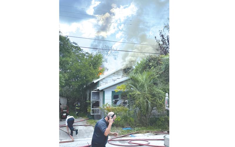 Firefighters from the Lake City Fire Department and Columbia County Fire Rescue responded to a house fire on NE Richardson Terrace Tuesday afternoon. (COURTESY)