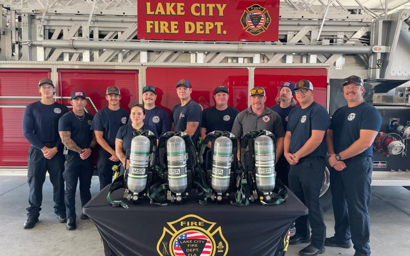 Lake City Fire Department firefighters Sam Watkins (from left), Angel Ovalle, Jerney Morgan, Christina Munro, Leon Jones, AJ Parnell, Trent Kreienheder, Stephen Coody, Elliot Redish, Gramby Croft and Matt Herdon stand with equipment that was recently donated as a result of the department getting a Firehouse Subs Public Safety Foundation grant. The total price for the equipment was $39,469. (COURTESY LAKE CITY FIRE DEPARTMENT)