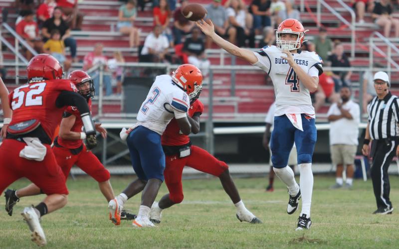 Branford quarterback Trent Land releases a pass against Dixie County in the Preseason Classic on Aug. 15. (PAUL BUCHANAN/Lake City Reporter)