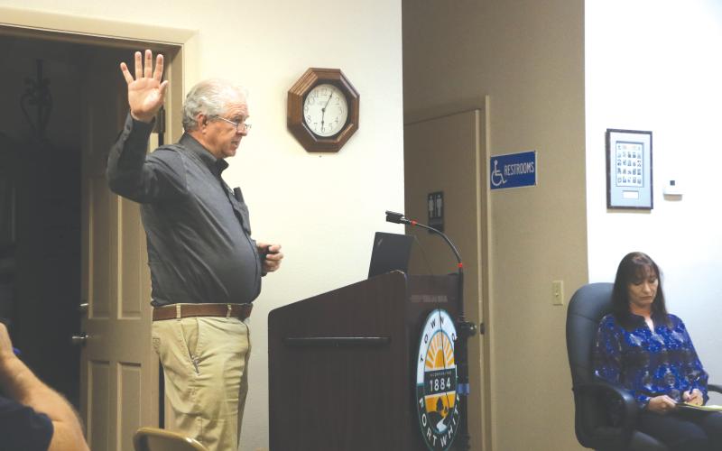 North Florida Professional Services President Greg Bailey speaks during Thursday’s meeting in Fort White. (MORGAN MCMULLEN/Lake City Reporter)