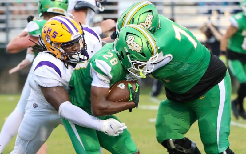 Columbia defensive tackle Jaylen Underwood tackles Suwannee running back Lou Jack Smith last Friday. (BRENT KUYKENDALL/Lake City Reporter)