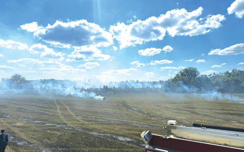 Columbia County Fire Rescue trucks battle a brush fire near NW Suwannee Valley Road and NW Cambridge Hill Way over the weekend. (COURTESY COLUMBIA COUNTY FIRE RESCUE)