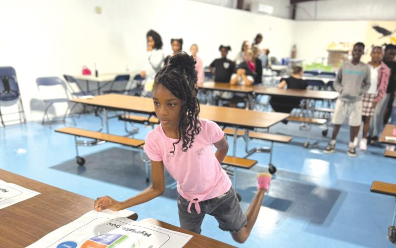 Niblack Elementary students participated in a Food Group Relay in which students such as Julianna Thomas, practiced sorting foods into the correct groups. (COURTESY)