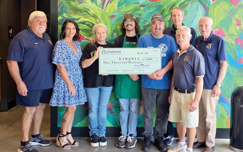 The Live Oak Kiwanis Club received a $1,000 grant from the Starbucks Foundation’s Neighborhood Grants program. Pictured are Tony Cameron (from left), Monja Slater, treasurer/past Lt. governor; Sara Sears, Starbucks manager; Tyler Neidlinger, Starbucks assistant manager; Jay Tull, Kiwanis president; Danny Hales, Joe Flanagan and Stan Storey. (COURTESY)