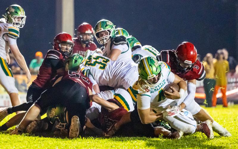 Suwannee quarterback Thomas Sikes scores on a 1-yard touchdown run against Lafayette last Friday. (JACK HOWDESHELL/Lake City Reporter)