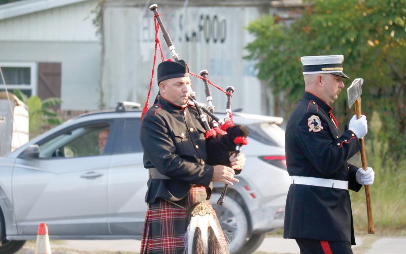 Matthugh Garbett with the Suwannee County Fire Rescue honor guard plays the bagpipes during last Thursday’s Patriot Day remembrance at the Live Oak Fire Department. (JAMIE WACHTER/Lake City Reporter)