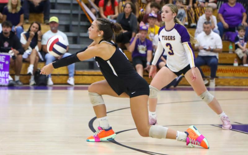 Columbia hitter Sinei Wood digs a shot against Suwannee on Sept. 11. (BRENT KUYKENDALL/Lake City Reporter)