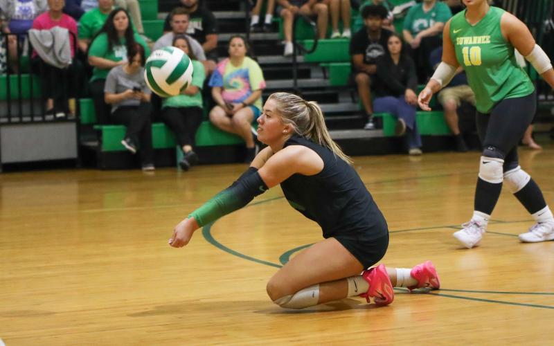 Suwannee libero Ansleigh Kelley dives for a dig against Columbia on Oct. 9. (BRENT KUYKENDALL/Lake City Reporter)