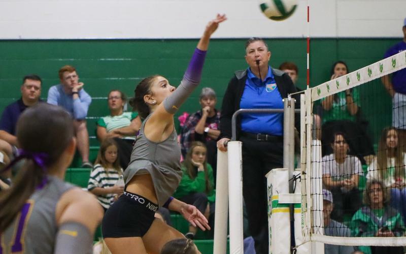 Columbia hitter Sinei Wood fires a shot against Suwannee on Thursday. (BRENT KUYKENDALL/Lake City Reporter)