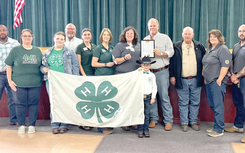 The Columbia County Commission approved a proclamation Thursday declaring Oct. 5-11 as National 4-H Week in Columbia County. Accepting the proclamation were UF/IFAS Columbia County Extension agents and 4-H youth. (JAMIE WACHTER/Lake City Reporter)