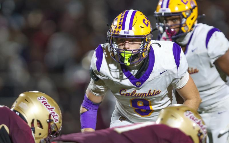 Columbia defensive end Kyten Davis lines up for a snap against St. Augustine last Friday. (GARY LLOYD MCCULLOUGH/Special to the Reporter)