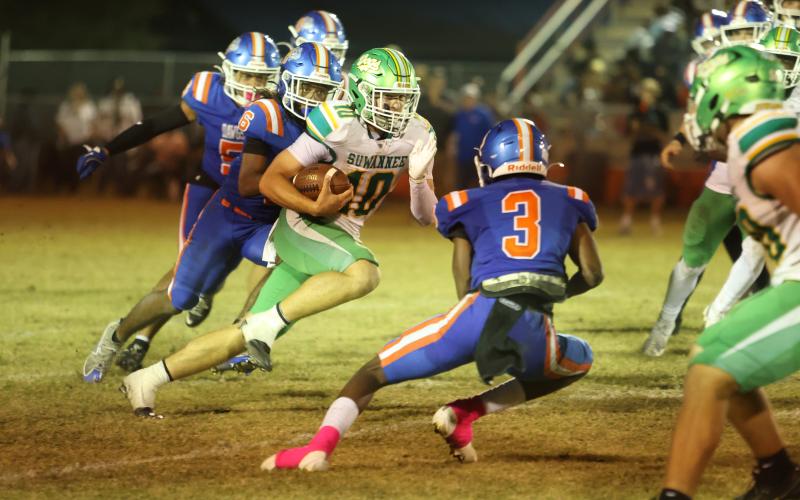 Suwannee quarterback Koy Frier scrambles up the field against Taylor County on Friday. (PAUL BUCHANAN/Lake City Reporter)