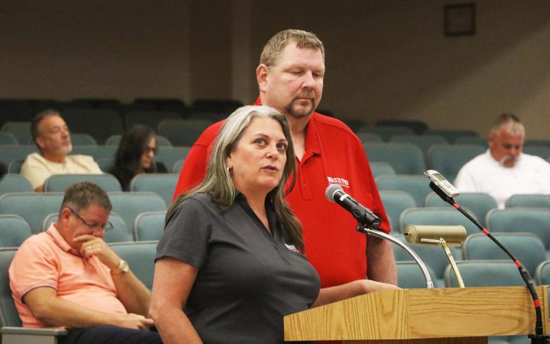 WastePro Florida Government Affairs Director Dana WIlliams (left) and WastePro Lake City Manager Frank Kramer discussed WastePro’s contract proposal with the county at its Thursday meeting. (MORGAN MCMULLEN/Lake City Reporter)