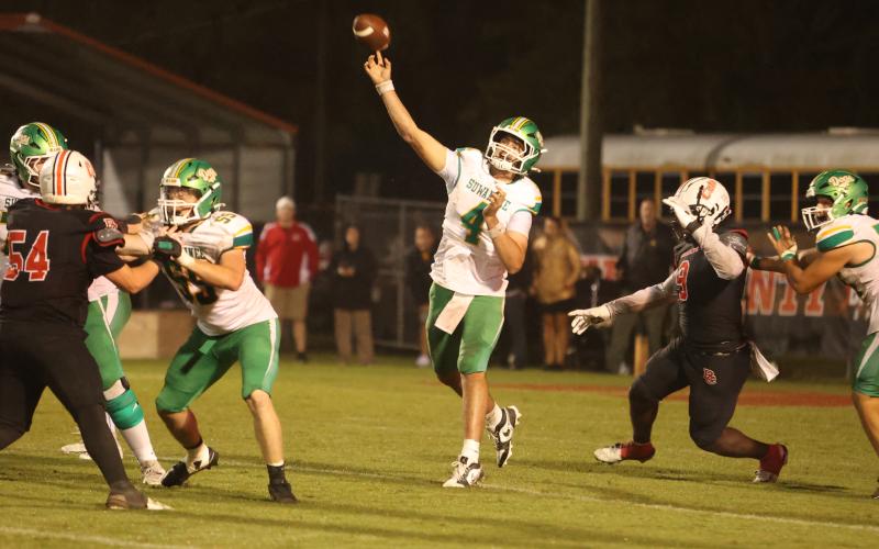 Suwannee quarterback Thomas Sikes throws a pass against Baker County last Friday. (PAUL BUCHANAN/Lake City Reporter)