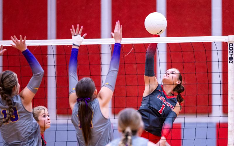 Lafayette hitter Brooke Lamb fires a shot against Columbia on Sept. 29. (JACK HOWDESHELL/Lake City Reporter)