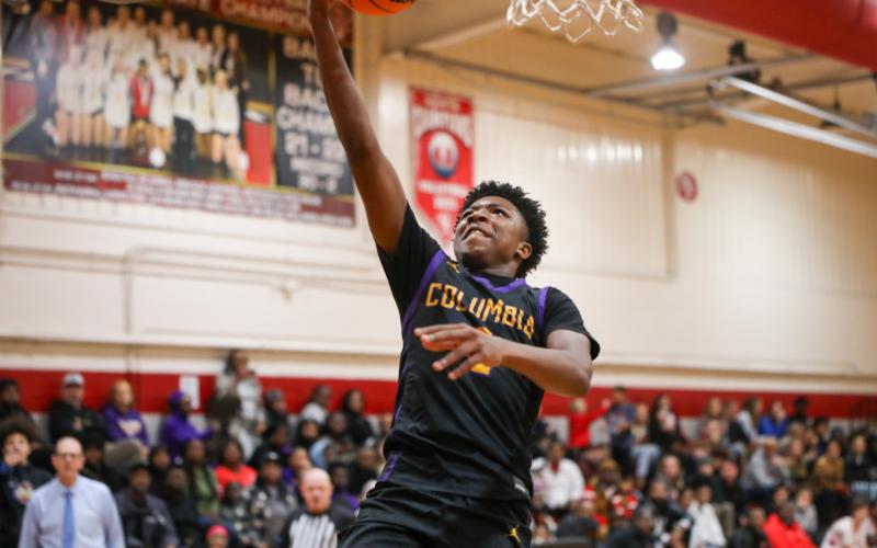 Columbia guard Shaheed White rises for a layup against Santa Fe last season. (FILE )
