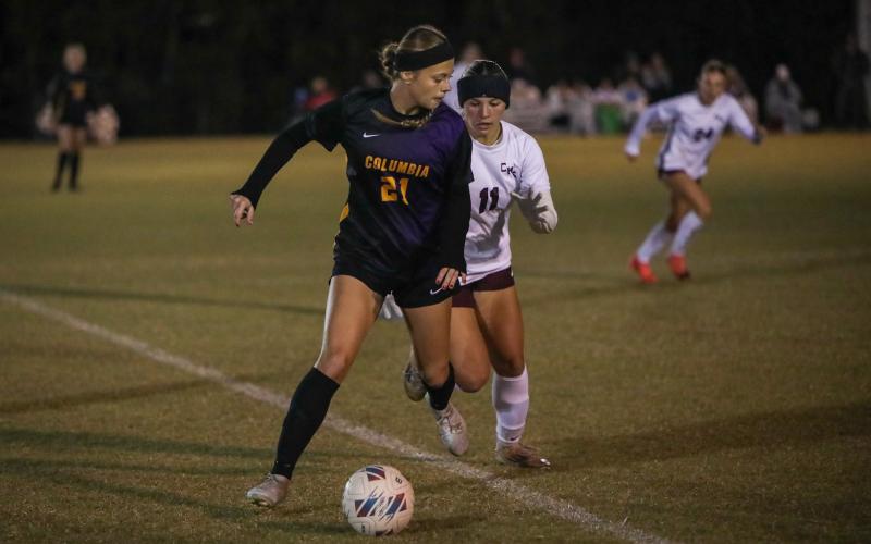 Columbia's Laelle Thompson dribbles against Chiles on Nov. 11. (BRENT KUYKENDALL/Lake City Reporter)