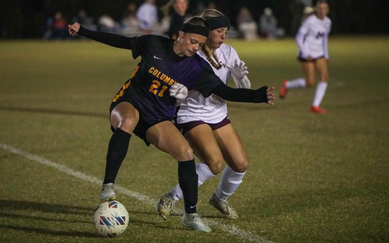 Columbia's Laelle Thompson tries to maintain possession against Chiles on Nov. 11. (BRENT KUYKENDALL/Lake City Reporter)