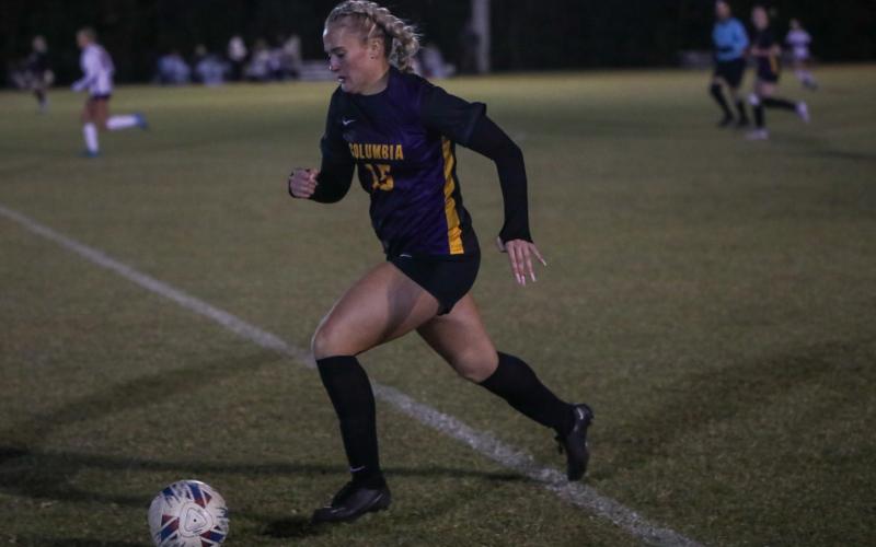 Columbia's Zoe Bulock dribbles up the field against Chiles on Nov. 11. (BRENT KUYKENDALL/Lake City Reporter)