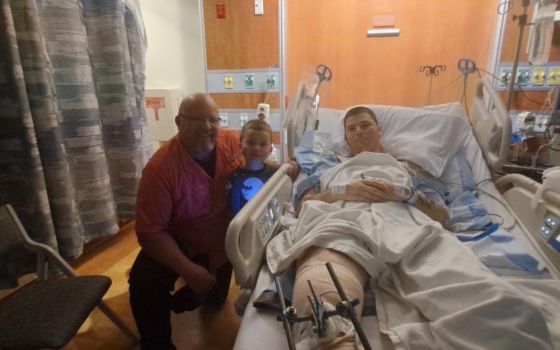 Christopher Davis, a Live Oak police officer, was released from UF Health Shands Hospital on Wednesday. He was seriously injured in a motorcycle crash last Thursday. (COURTESY)