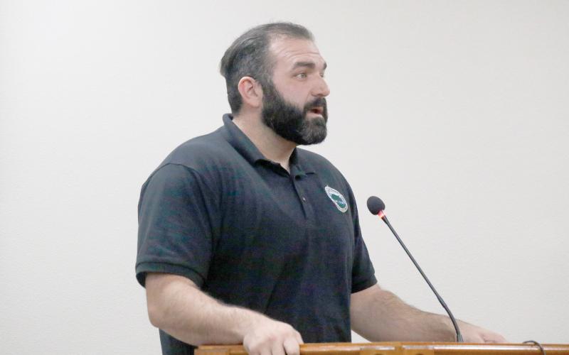Nicholas Frigiola, the Live Oak Community Redevelopment Agency director, speaks with the Suwannee County legislative delegation Wednesday about CRA districts and their future. (JAMIE WACHTER/Lake City Reporter)