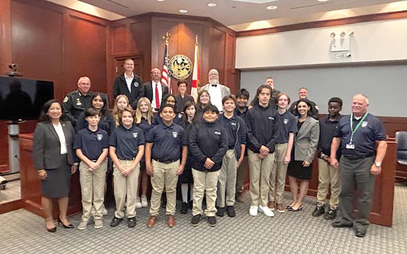 Students in Epiphany Catholic School’s ASTRA Club met with Circuit Judge Leandra Johnson, Sheriff Wallace Kitchings, Clerk of Court Jay Swisher, State Attorney John Durrett and Public Defender Cliff Wilson last week to learn about the judicial system. (COURTESY)
