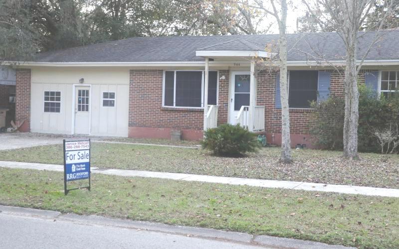 A ‘For Sale’ sign sits in a Lake City house’s front yard previously. Lake City recently saw a 21.4% reduction in close sales on single-family homes for the third quarter of 2025 from the 2024 mark. (FILE)