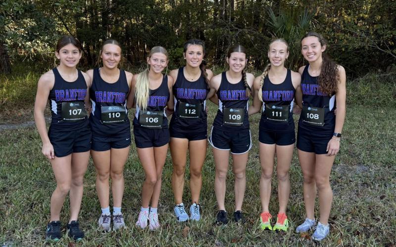 The Branford girls cross country team placed seventh at the Region 1-1A meet on Friday to advance to state for the first time in program history. (COURTESY)