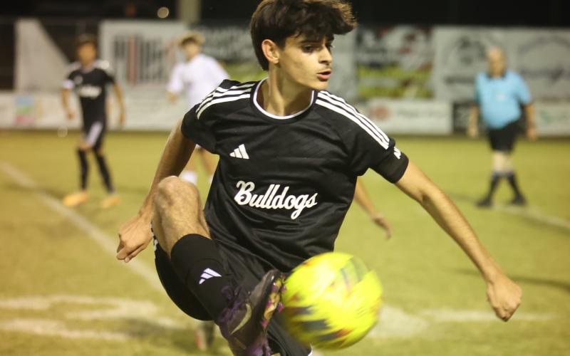 Suwannee's Rember Alonso gathers possession against Columbia on Nov. 5. (PAUL BUCHANAN/Lake City Reporter)