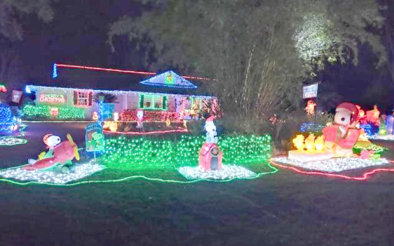 The Peanuts Christmas lights display at Carolyn Saft’s house in the Greenbriar subdivision is an annual tradition for Suwannee County residents. (COURTESY)