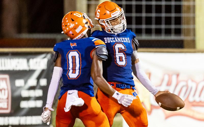 Branford running back TC Smith (6) celebrates with receiver Maurice Vought after scoring a touchdown against Hilliard on Sept. 26. (JACK HOWDESHELL/Lake City Reporter)