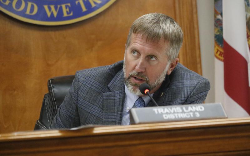 Travis Land, the Suwannee County Commission chairman, said he supported the change for the Frier Finance property to help providing housing in the future. (JAMIE WACHTER/Lake City Reporter)