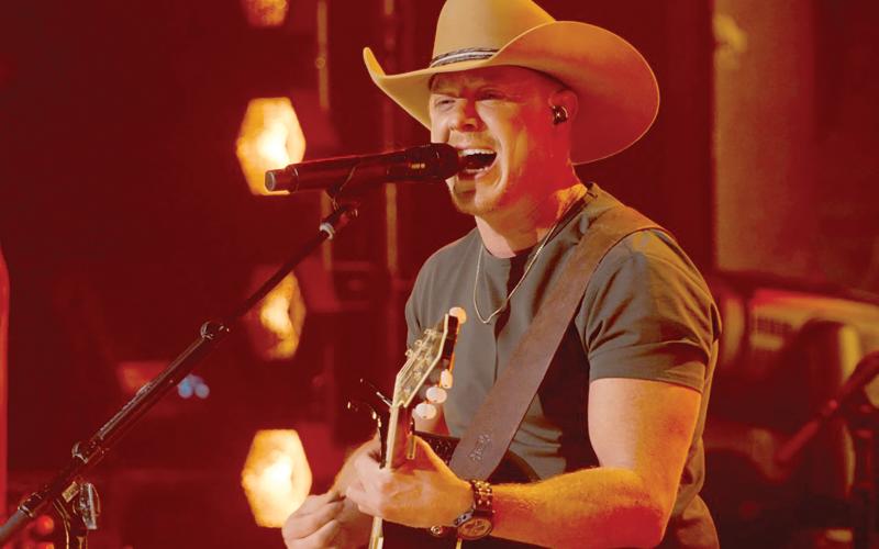Lake City’s Adam Sanders performs during last week’s airing of ‘The Road’ on CBS. Sanders is one of three finalists in the reality series that concludes Sunday. (COURTESY)