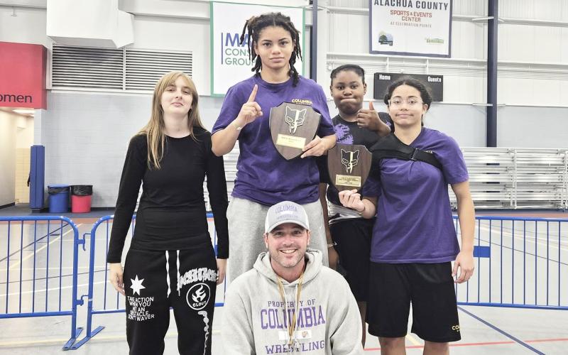 The Columbia girls wrestling team had four wrestlers place at the Bobcat Round Robin on Friday. (COURTESY)