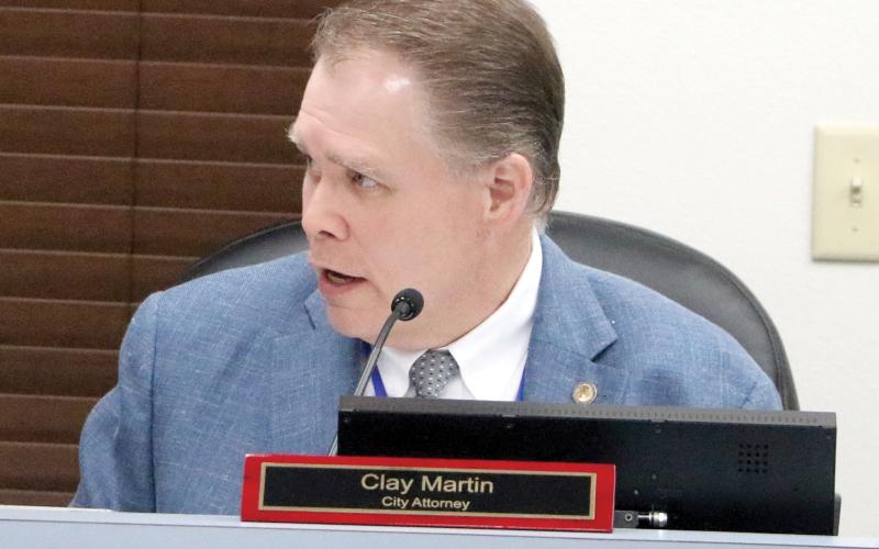 Lake City Attorney Clay Martin speaks during Monday’s City Council meeting. (MORGAN MCMULLEN/Lake City Reporter)