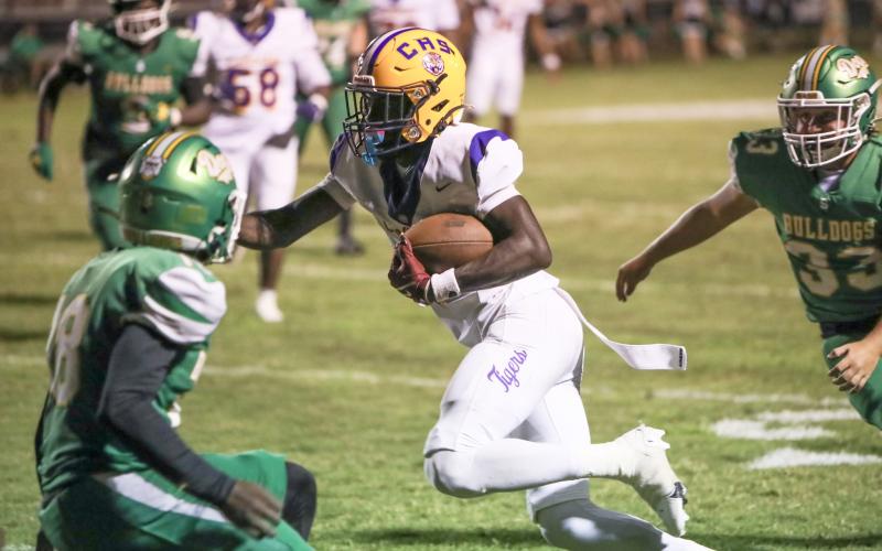 Columbia receiver Kyren Caldwell cuts upfield after a catch against Suwannee on Aug. 22. (BRENT KUYKENDALL/Lake City Reporter)