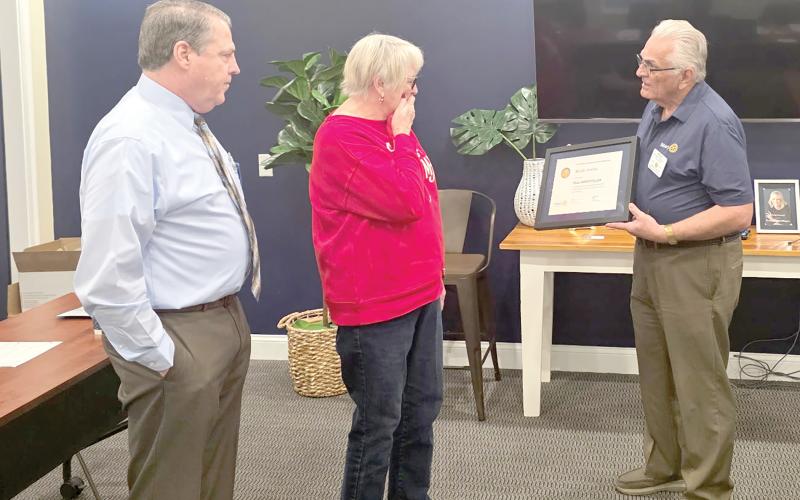 Meally Jenkins, the founder of the Christmas Dream Machine, reacts as the Rotary Club of Lake City Sunrise recognized her as a Paul Harris Fellow during its Dec. 3 meeting. (COURTESY ROTARY CLUB OF LAKE CITY SUNRISE)