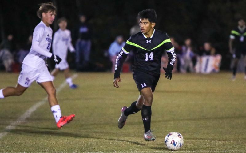 Columbia's David Gomez dribbles while looking for an open teammate against Keystone Heights on Nov. 10, 2025. (BRENT KUYKENDALL/Lake City Reporter)