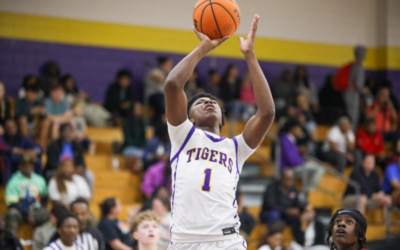 Columbia guard Shaheed White makes a layup against The Rock on Jan. 6. (BRENT KUYKENDALL/Lake City Reporter)