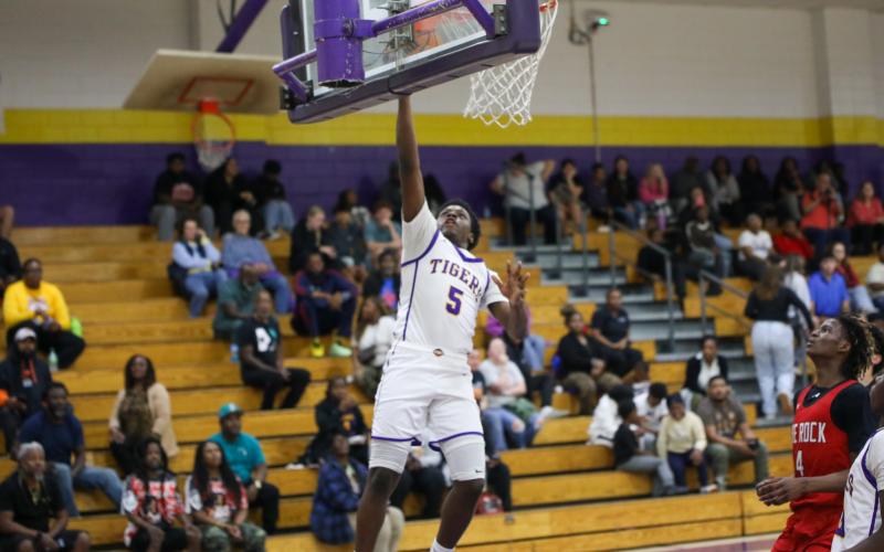 Columbia guard Zaeon Jones makes a layup against The Rock on Jan. 6. (BRENT KUYKENDALL/Lake City Reporter)